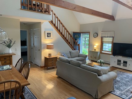 Eastham Cape Cod vacation rental - View of living room and dining area from kitchen!
