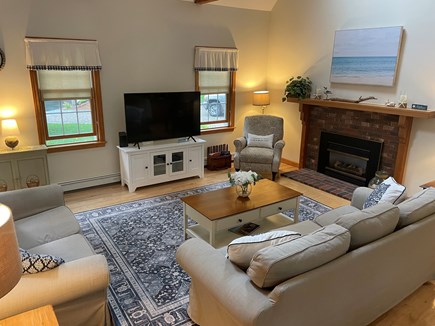 Eastham Cape Cod vacation rental - Vaulted living room with skylights and TV- bright and airy!