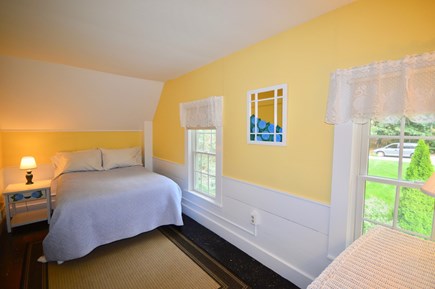Wellfleet Cape Cod vacation rental - Upstairs bedroom with full size bed, closet, dresser, central AC
