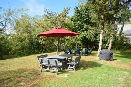 Wellfleet Cape Cod vacation rental - Large yard with fire pit and outdoor dining