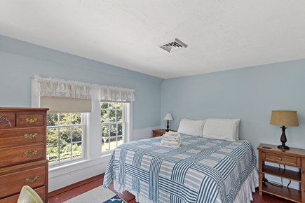 Wellfleet Cape Cod vacation rental - Sunny queen bedroom with dresser and closet with central AC vent