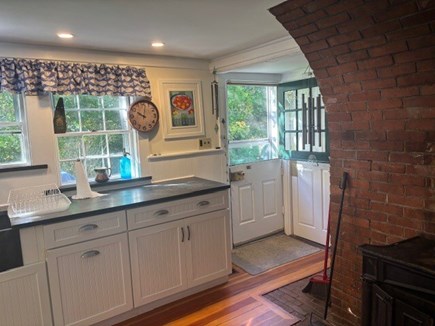 Yarmouth, Bass River Village in South Ya Cape Cod vacation rental - Charming Dutch door to verdant sideyard lawn -the sun is waiting