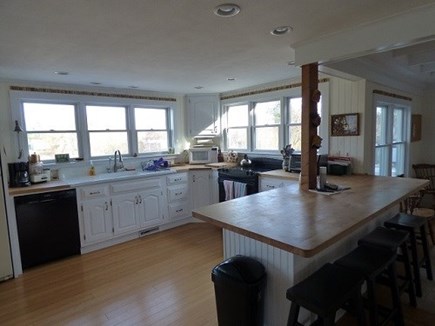 Dennis, East Dennnis Cape Cod vacation rental - Kitchen open to living room and dining room.