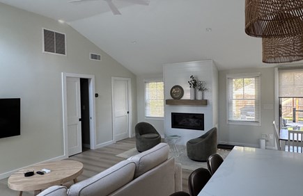 Popponesset Cape Cod vacation rental - Open floor plan with glass slider to deck and yard