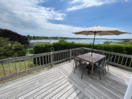 Chatham Cape Cod vacation rental - Wrap-around deck has water views, gas grill and table for dining
