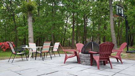 Eastham Cape Cod vacation rental - Large patio w/ fire-pit and some of the outdoor seating