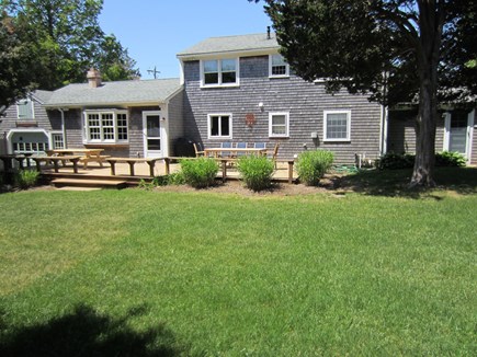 East Dennis Cape Cod vacation rental - Rear view with large deck & yard