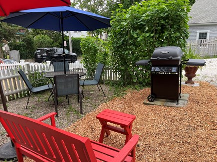 Provincetown Cape Cod vacation rental - Table and chairs and sitting area with grill.