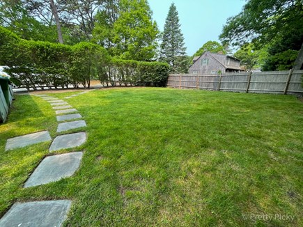 Brewster Cape Cod vacation rental - Big, safe yard where kids can play.  Follow the path to the beacD