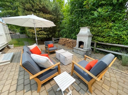 Brewster Cape Cod vacation rental - New patio furniture.  Note freestanding outdoor fireplace