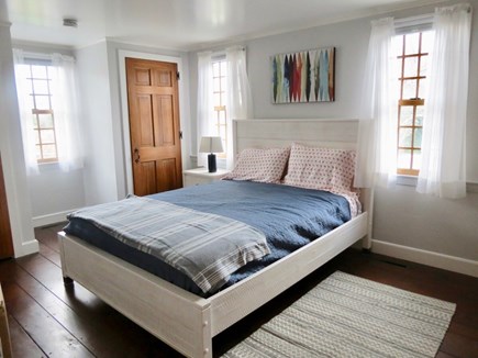 Brewster Cape Cod vacation rental - Main level queen bedroom is tastefully appointed
