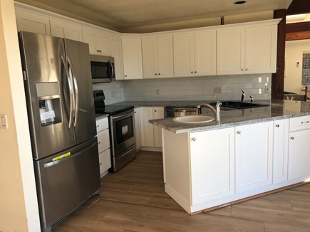 Truro Cape Cod vacation rental - New kitchen with attractive cabinets