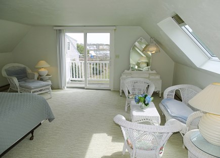 Harwich Port Cape Cod vacation rental - Upstairs queen master with sitting area and deck facing harbor
