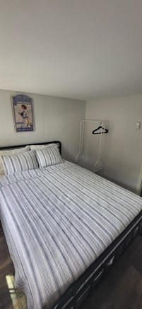 Dennis Cape Cod vacation rental - Hanging space with lower shelving for clothes storage (Bed 1 & 2)