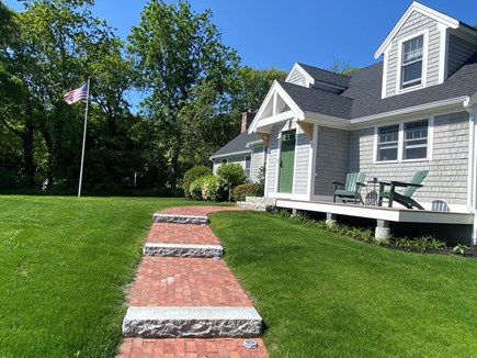 East Orleans Cape Cod vacation rental - Front Yard Flag w Privet Hedge Privacy. Morning Deck for Coffee.