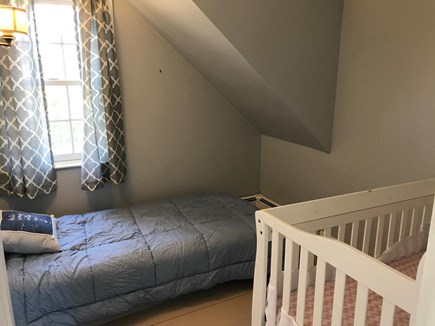 West Barnstable Cape Cod vacation rental - First floor bedroom with twin bed and crib