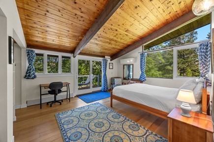Pocasset, Monument Beach Cape Cod vacation rental - Primary bedroom upstairs has wonderful views of woods and water.