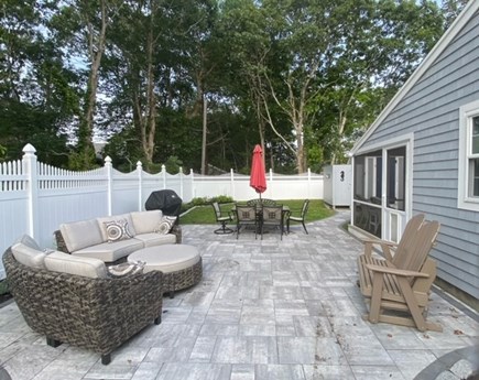 West Dennis Cape Cod vacation rental - 600 square foot patio with Weber grill - fenced-in backyard