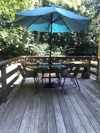 Eastham, Close to bay & ocean beaches! Cape Cod vacation rental - Deck with outdoor dining