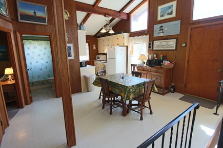 Truro Cape Cod vacation rental - Dining area and kitchen, bathroom and 2 bedrooms on same level