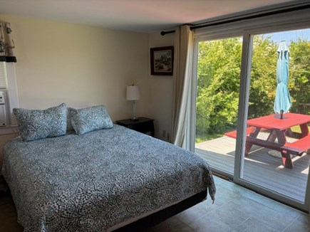 Wellfleet Cape Cod vacation rental - Queen bed has slider to private deck area.
