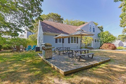 Dennis Port Cape Cod vacation rental - Side Yard with outdoor seating