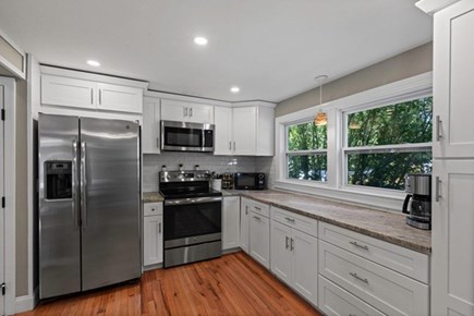 Dennis Port Cape Cod vacation rental - Kitchen features stainless steel appliances and gorgeous quartzite counters
