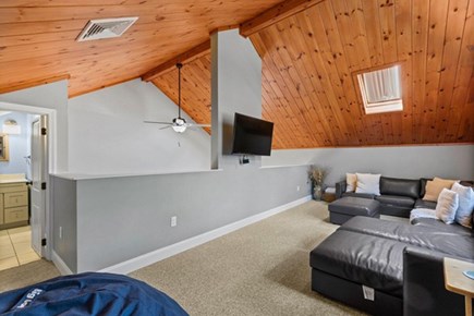 Dennis Port Cape Cod vacation rental - Second level loft living space features a TV and massive 8-person sectional