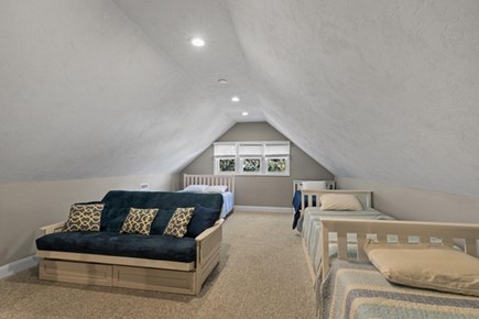 Dennis Port Cape Cod vacation rental - Second level sleeping area, featuring a queen bed and two twin beds