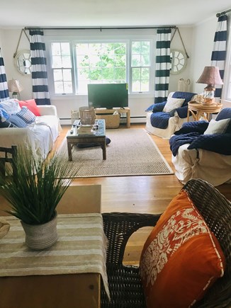 Hyannisport Cape Cod vacation rental - Spacious liv room w/ farm table for dining, puzzles, board games