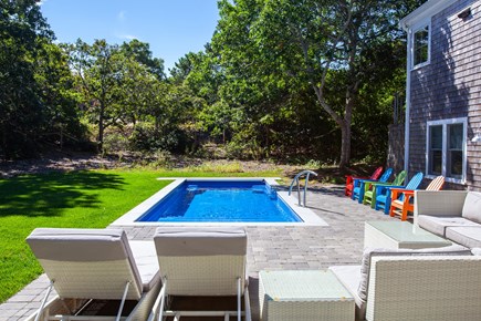Eastham Cape Cod vacation rental - Large fenced backyard with pool and outdoor furniture
