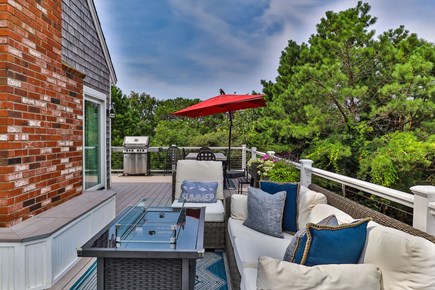 Eastham Cape Cod vacation rental - Outdoor dining on deck and a Napoleon grille!