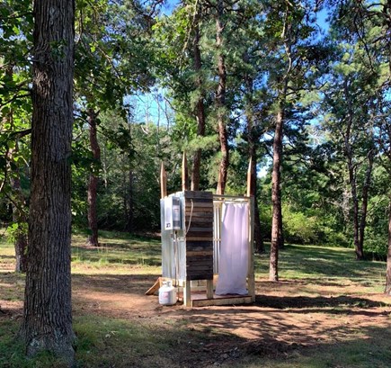 DENNIS Cape Cod vacation rental - Hot water shower just off the wooded path.