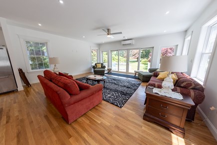Steps from Dennis Village and  Cape Cod vacation rental - Living space out onto back deck