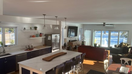 Steps from Dennis Village and  Cape Cod vacation rental - Kitchen and living reversed