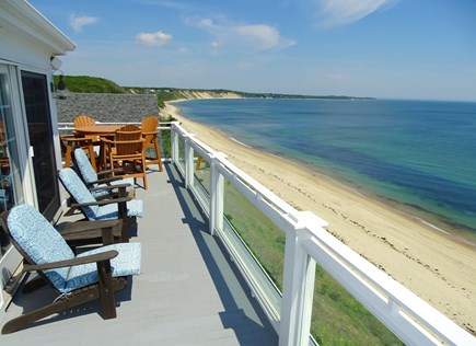 Sagamore Beach Cape Cod vacation rental - Top deck area with lounge chairs and dining table