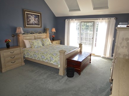 Yarmouth Cape Cod vacation rental - The master bedroom has as King bed and a private deck