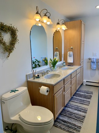 Brewster Cape Cod vacation rental - 2nd floor master bathroom to king bedroom.