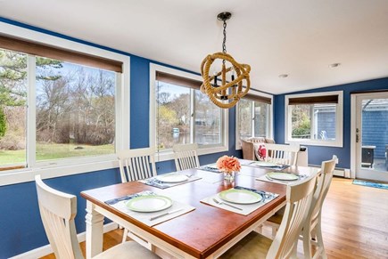 South Yarmouth Cape Cod vacation rental - Bright family dining room overlooking the pond