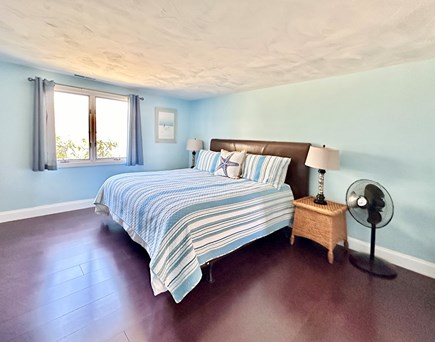 South Yarmouth Cape Cod vacation rental - In-law master bedroom w California king bed, HW fl & its own bath