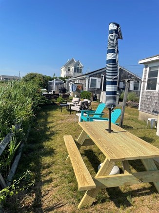 West Dennis Cape Cod vacation rental - Backyard seating area