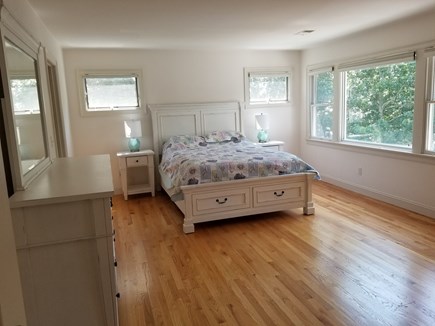 New Seabury area Cape Cod vacation rental - Master bedroom with new queen and dressers overlooking water