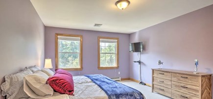 Onset MA vacation rental - Master Bedroom with TV, walk-in-closet, and Jacuzzi Bath/shower.