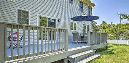 Onset MA vacation rental - Large yard with patio furniture & garden shower hose to wash off.