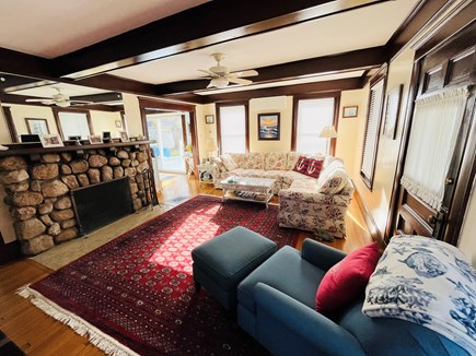 Falmouth Heights Cape Cod vacation rental - Living room with access to dining room, kitchen and porch.