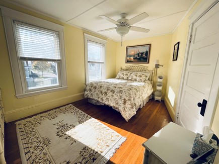 Falmouth Heights Cape Cod vacation rental - BR #1 Queen w/ceiling fan & views of ocean and Martha's Vineyard.