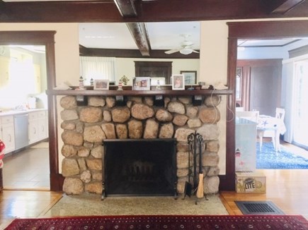 Falmouth Heights Cape Cod vacation rental - Original stone (wood burning) fire place in living room.
