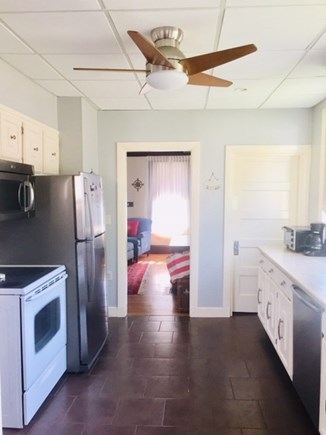 Falmouth Heights Cape Cod vacation rental - Kitchen w/microwave, oven/stove, Bosch dishwasher & coffee maker.