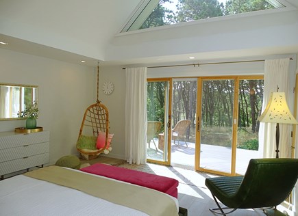 Wellfleet Cape Cod vacation rental - California king master bed w/ slider to 3rd deck and wooded views