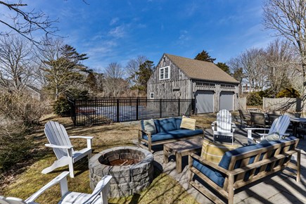 Chatham Cape Cod vacation rental - Outdoor lounge and firepit area (updated w/ Solo Stove)